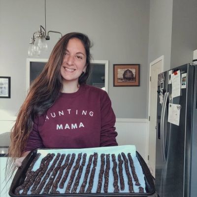 Beka Garris holding tray of homemade jerky