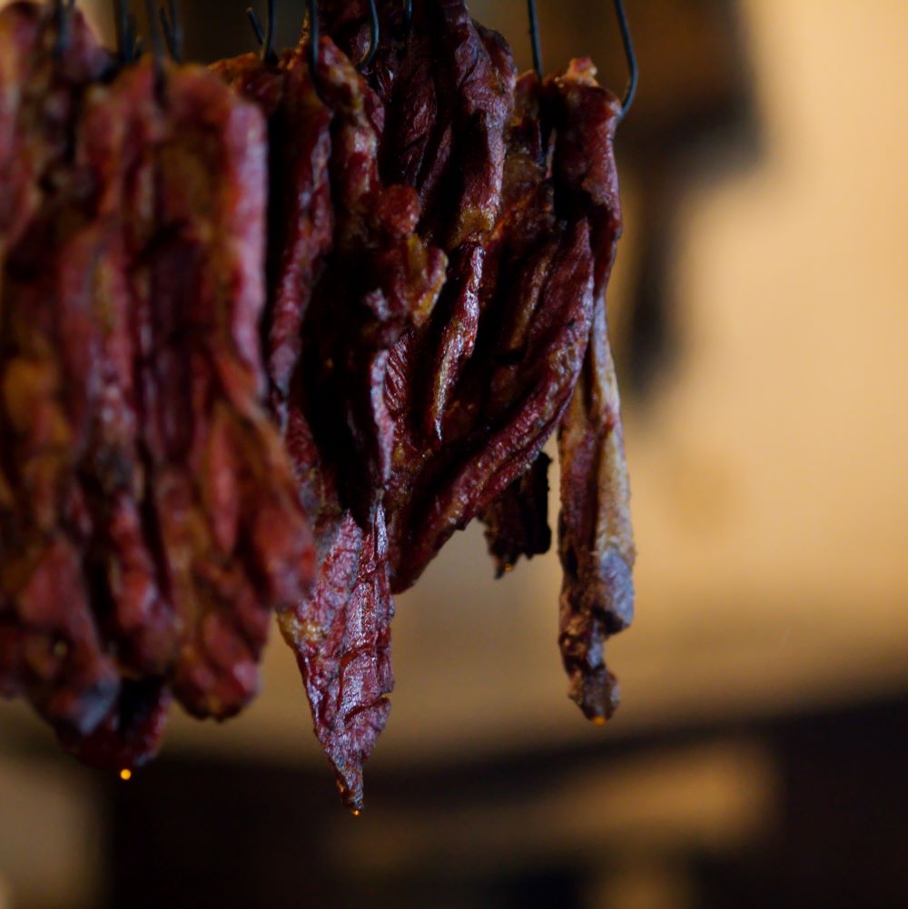 Delicious tender beef jerky on the table