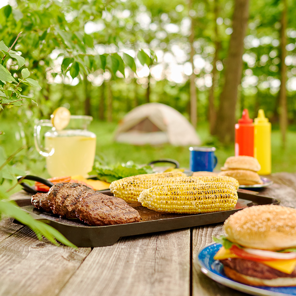 Grilled Burgers and Corn at a Cookout